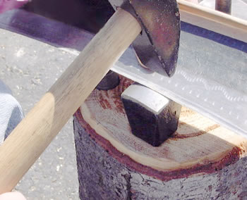 Peening the blade on the anvil