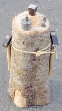 Log with anvil and hammering jig